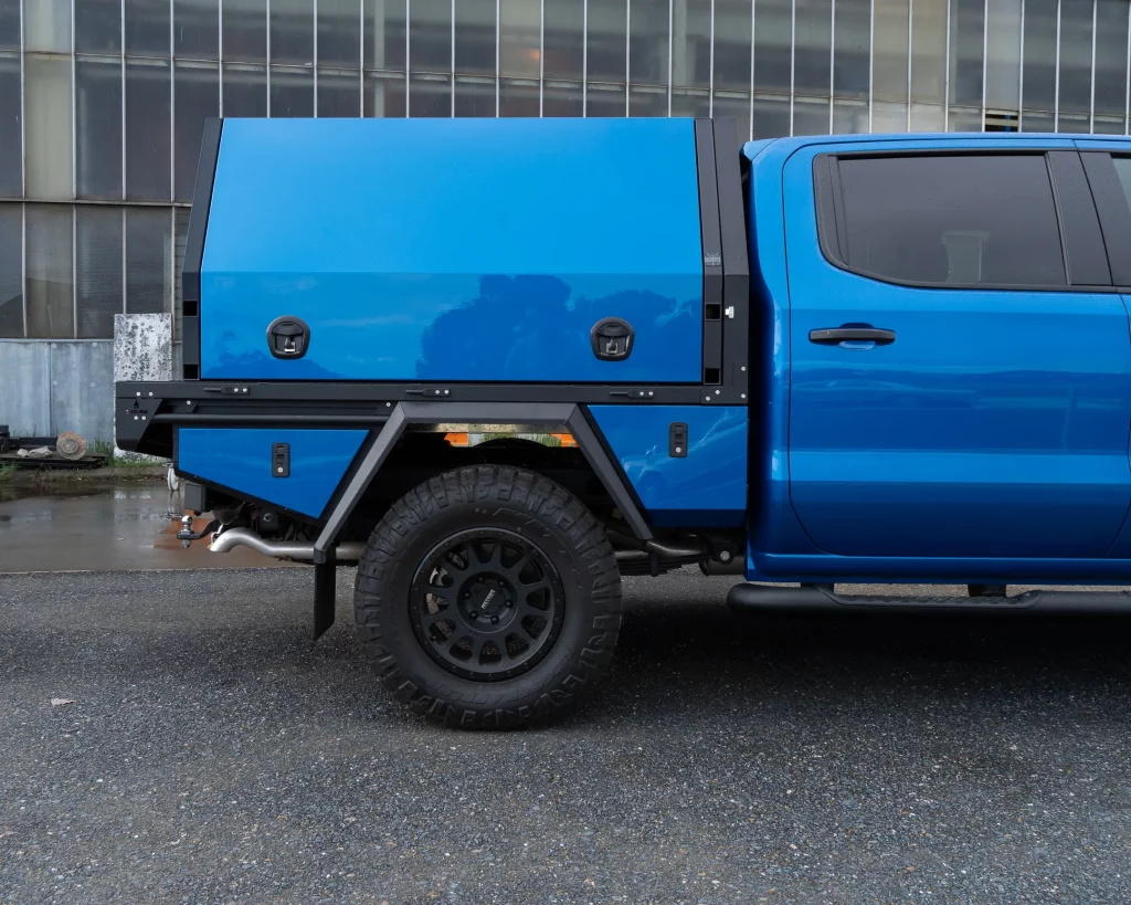 Blue Silverado Custom Tray and Canopy Side View