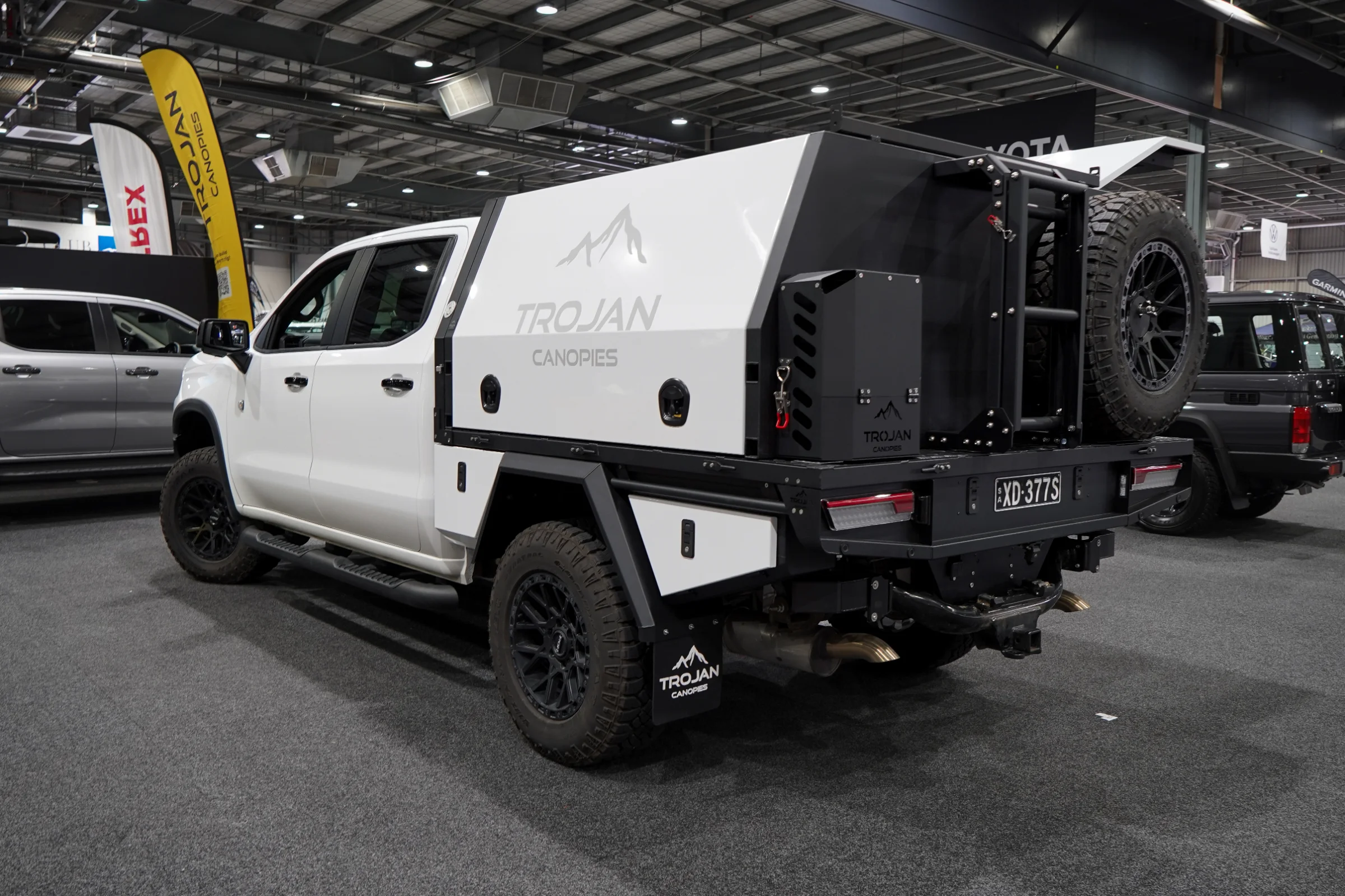 White Silverado ZR2 with Alloy Tray and Canopy from rear
